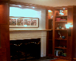 Built In Cherry Shelves Around Fireplace