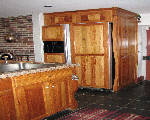 pine kitchen with refrigerator